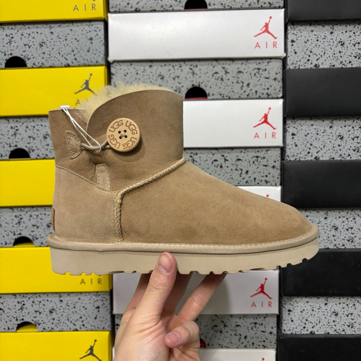 UGG Kallen Lace Mini Boot – Suede Ankle Boot with Shearling Cuff & Signature Button Closure in Sand