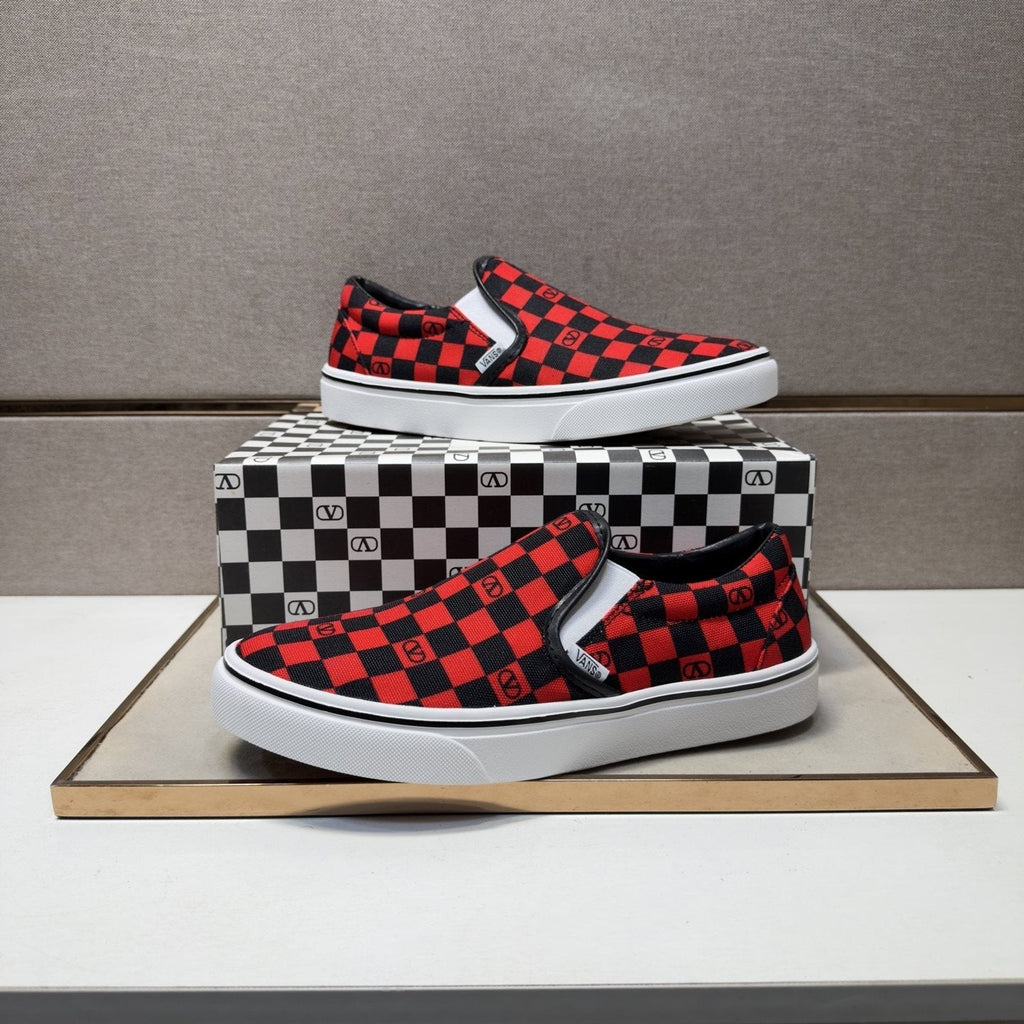 Vans Red and Black Checkerboard Slip-On Sneakers